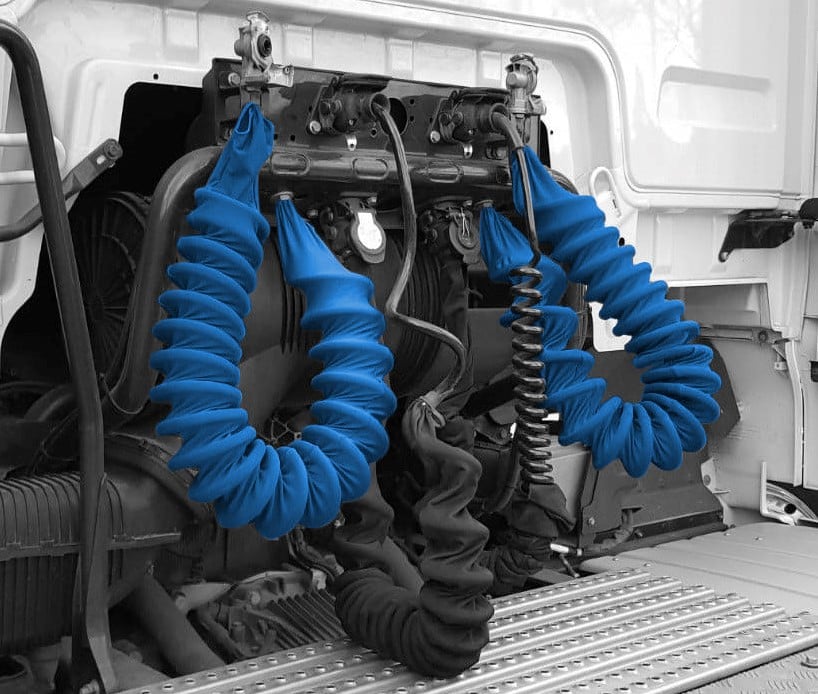 Sleeve for recoil air hose